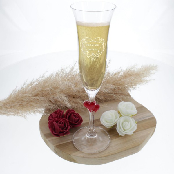 Champagner und Sektkelch \"Red Love\" mit einem roten Herz
